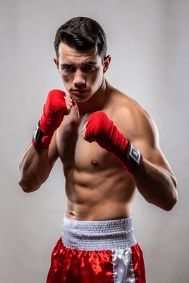 Muscular man boxing pose