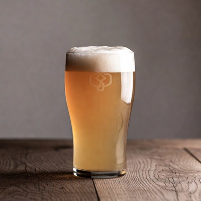 Pale Beer in Glass on Wood