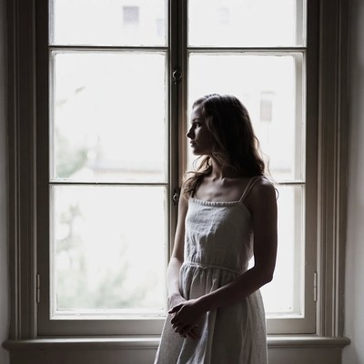 Woman gazing out window