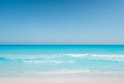 Turquoise Ocean Waves on Sandy Beach