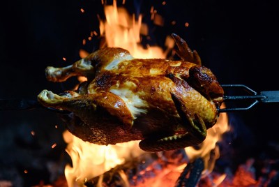 Roasted Chicken on Spit over Flames