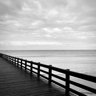 Black and White Wooden Pier Over Ocean