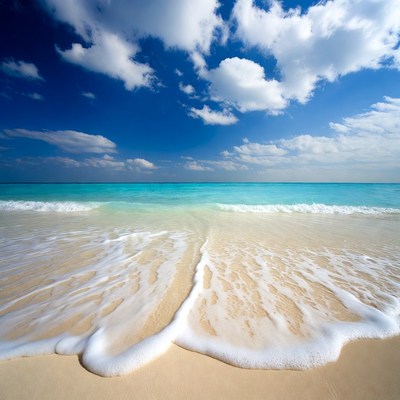 Sandy Beach with Turquoise Ocean Waves