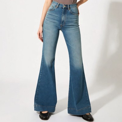 Woman wearing high-waisted flared jeans