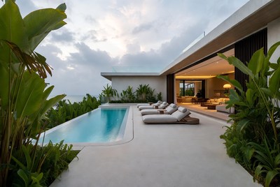 Modern infinity pool villa sunset