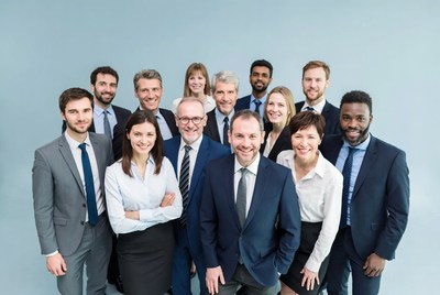 Diverse business team standing together