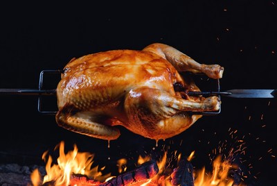 Roast Chicken on Spit over Fire