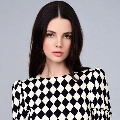 Woman in black white checkered blouse