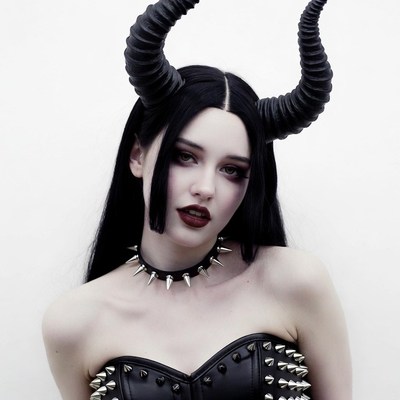 Woman with black demon horns