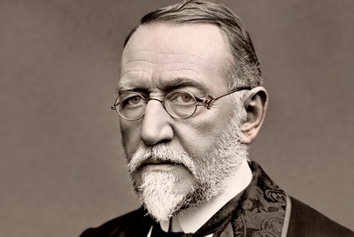 Elderly man with glasses and beard