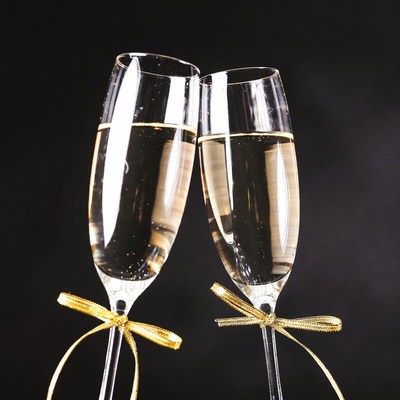 Two Champagne Glasses with Gold Ribbons