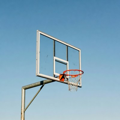 Basketball hoop on blue sky