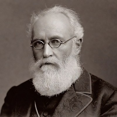 Elderly man with white beard and glasses