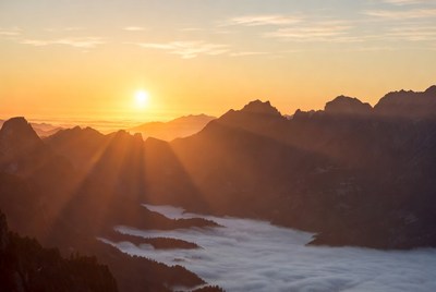 Sunrise over Mountains with Fog