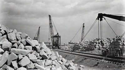 Vintage Cranes Loading Stone Piles