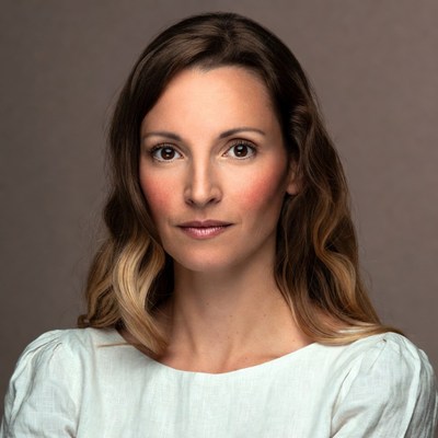 Woman with wavy brown hair