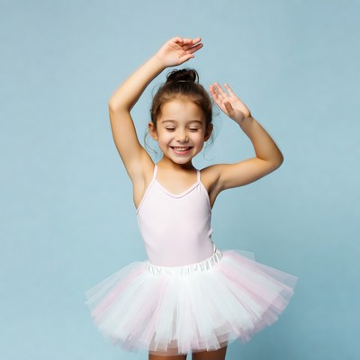 Happy girl dancing in tutu