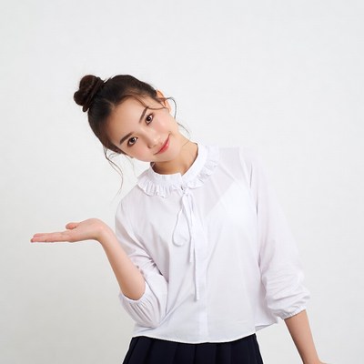 Asian girl presenting with hand on white background