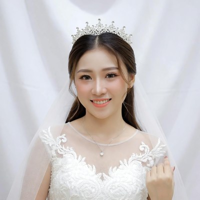 Asian bride with tiara and veil