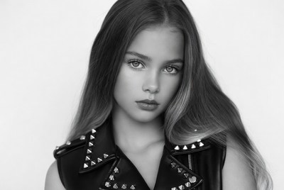 Girl in studded leather vest