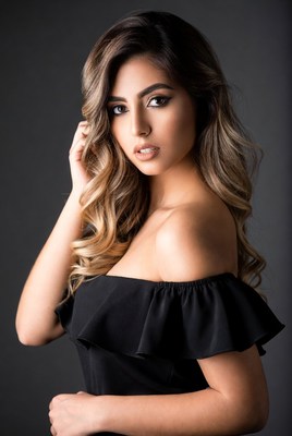 Beautiful woman in off-shoulder black dress
