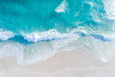 Turquoise Ocean Waves Crashing on Beach