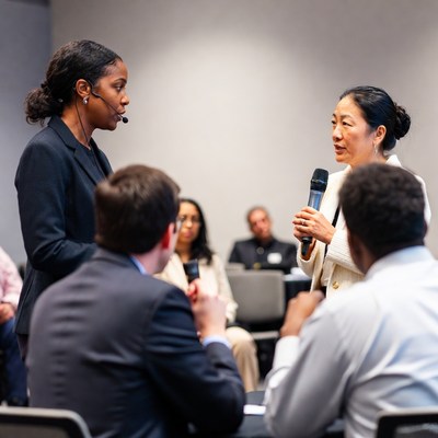 African-American woman speaking at conference
