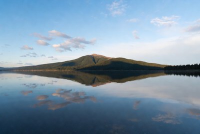 Mountain reflected in calm lake