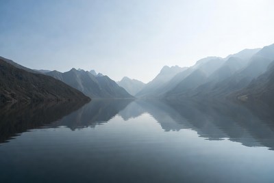 Mountain Range Reflecting in Calm Lake