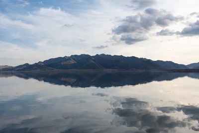 Mountains reflected in calm lake