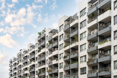 Modern White Apartment Building with Balconies