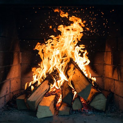 Blazing Fire in Brick Fireplace