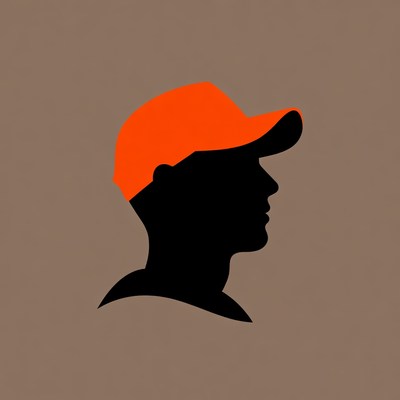 Man's silhouette wearing orange cap