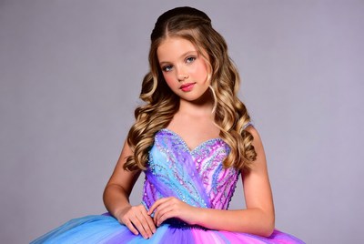 Girl in sparkly purple tutu dress