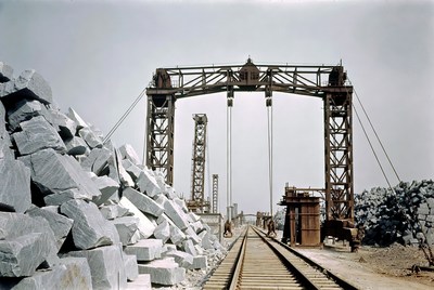 Industrial stone quarry crane over railroad