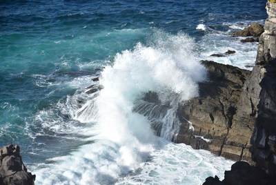 Ocean Waves Crashing on Rocks
