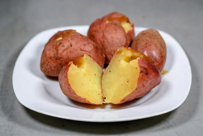 Baked Potatoes on White Plate