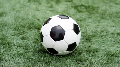 Soccer ball on green grass
