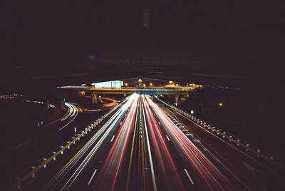 Night highway with light trails