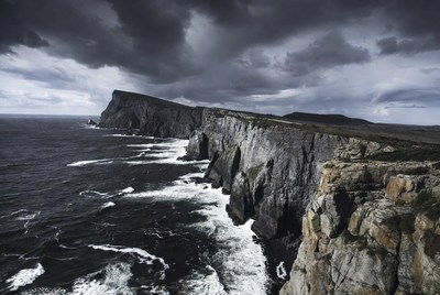 Dramatic Sea Cliffs Under Stormy Skies