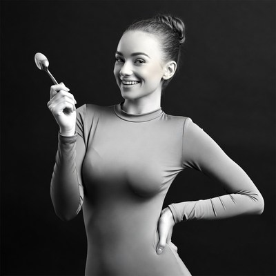 Woman holding spoon