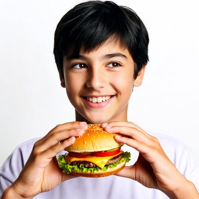 Boy holding burger