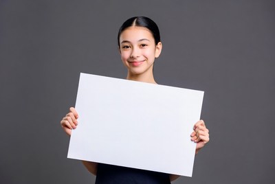 Asian girl holding blank sign