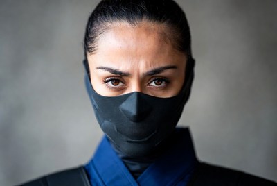 Woman wearing black face mask