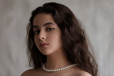 Woman with pearl necklace