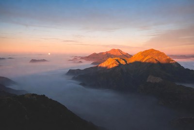 Mountains in Fog at Sunrise