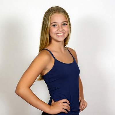 Smiling blonde girl in tank top
