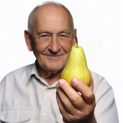 Elderly man holding pear