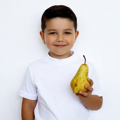 Boy holding yellow pear