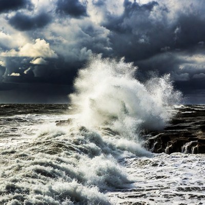 Ocean Wave Crashing on Rocks